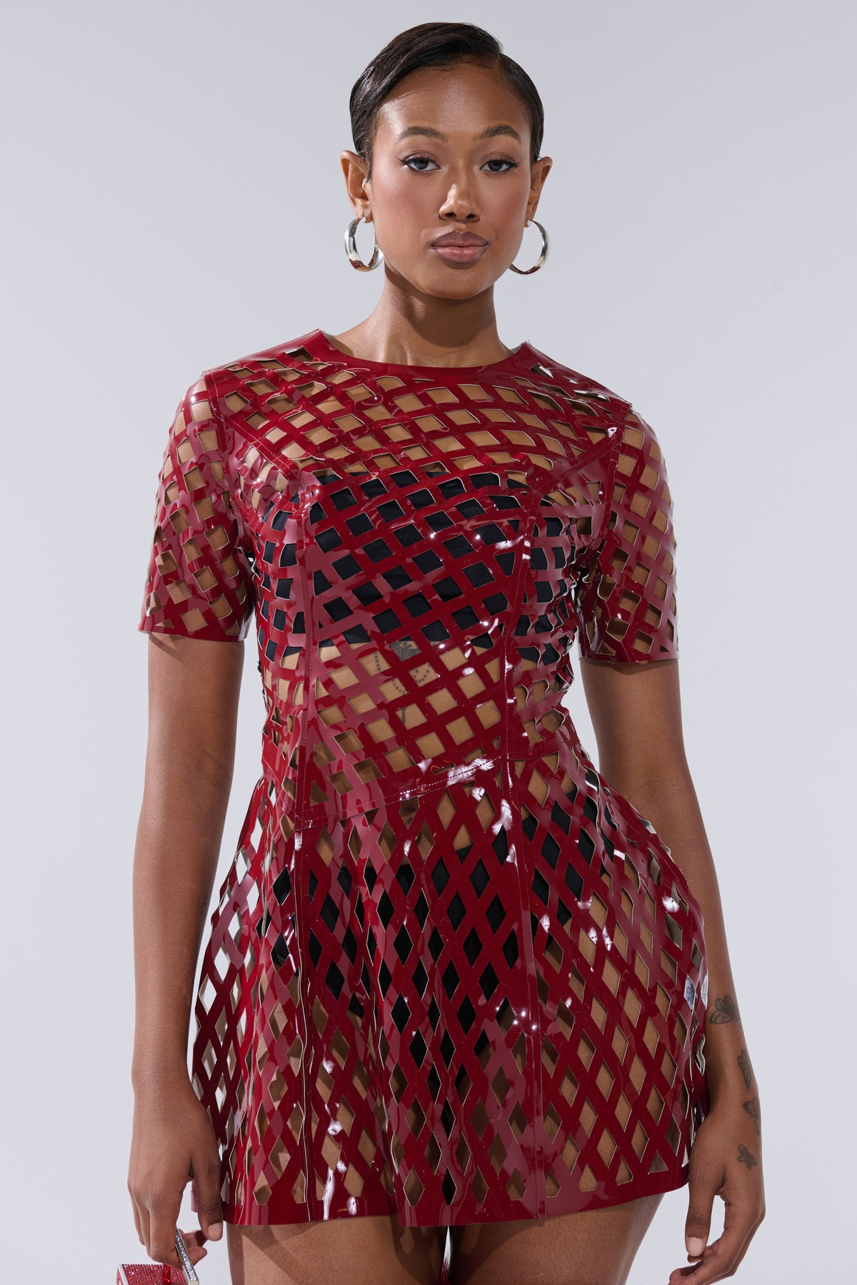 SHE'S DIFFERENT CUT OUT FAUX LEATHER MINI DRESS IN BURGUNDY